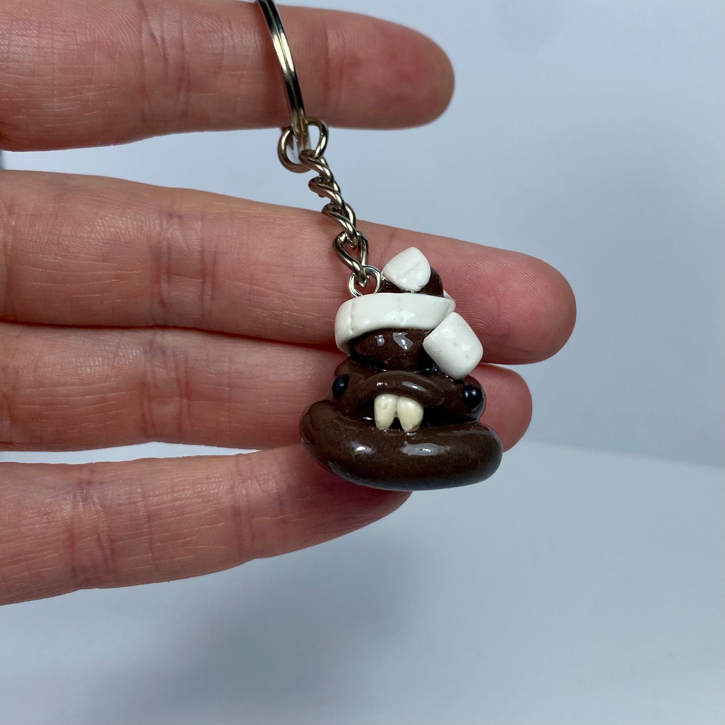 Caca enredada | Llavero