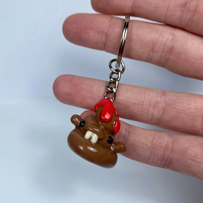 Caca estreñida | Llavero