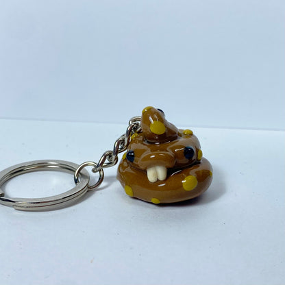 Caca intolerante a la lactosa | Llavero